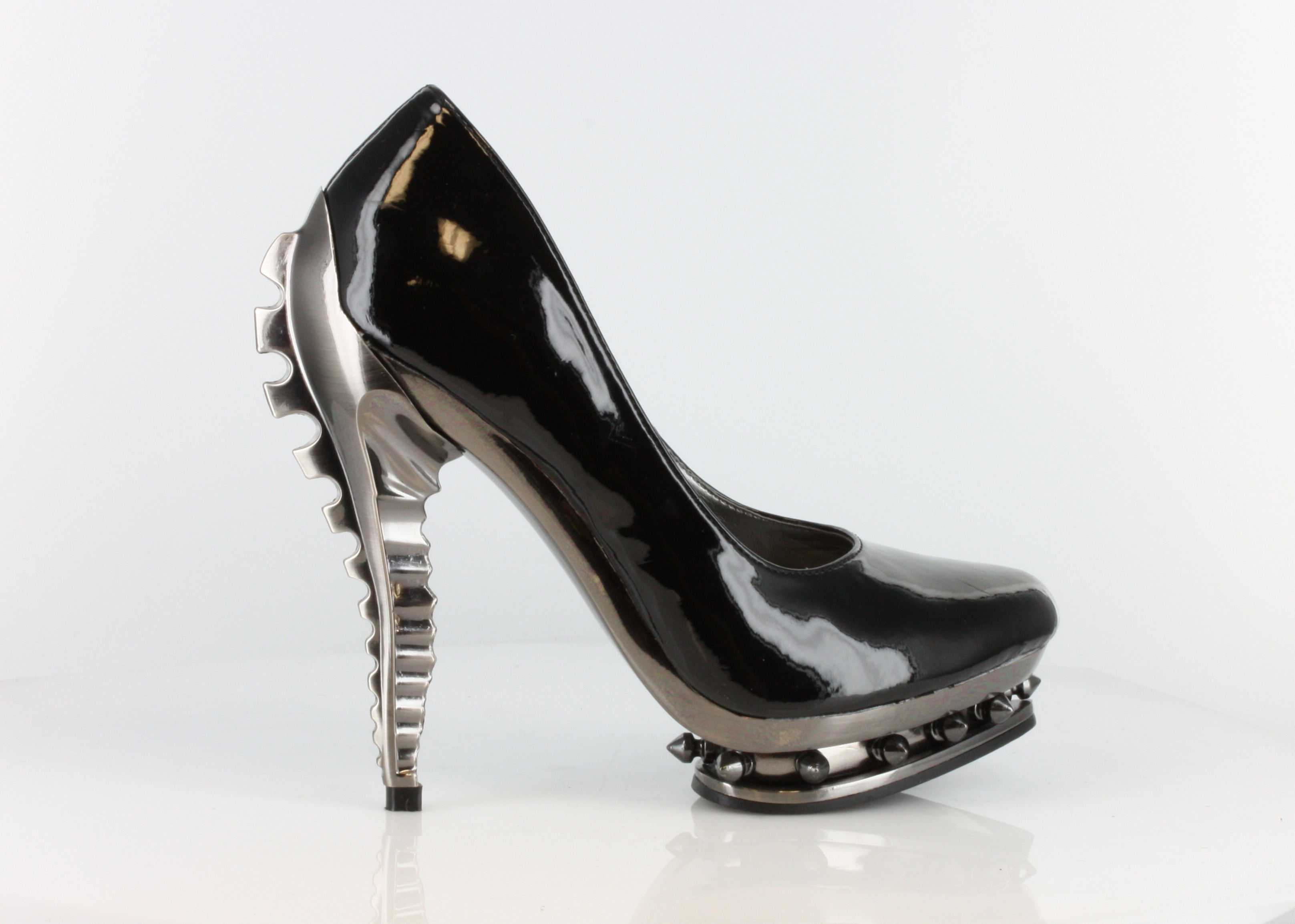 Predator - Chrome Heel Double Platform Pumps